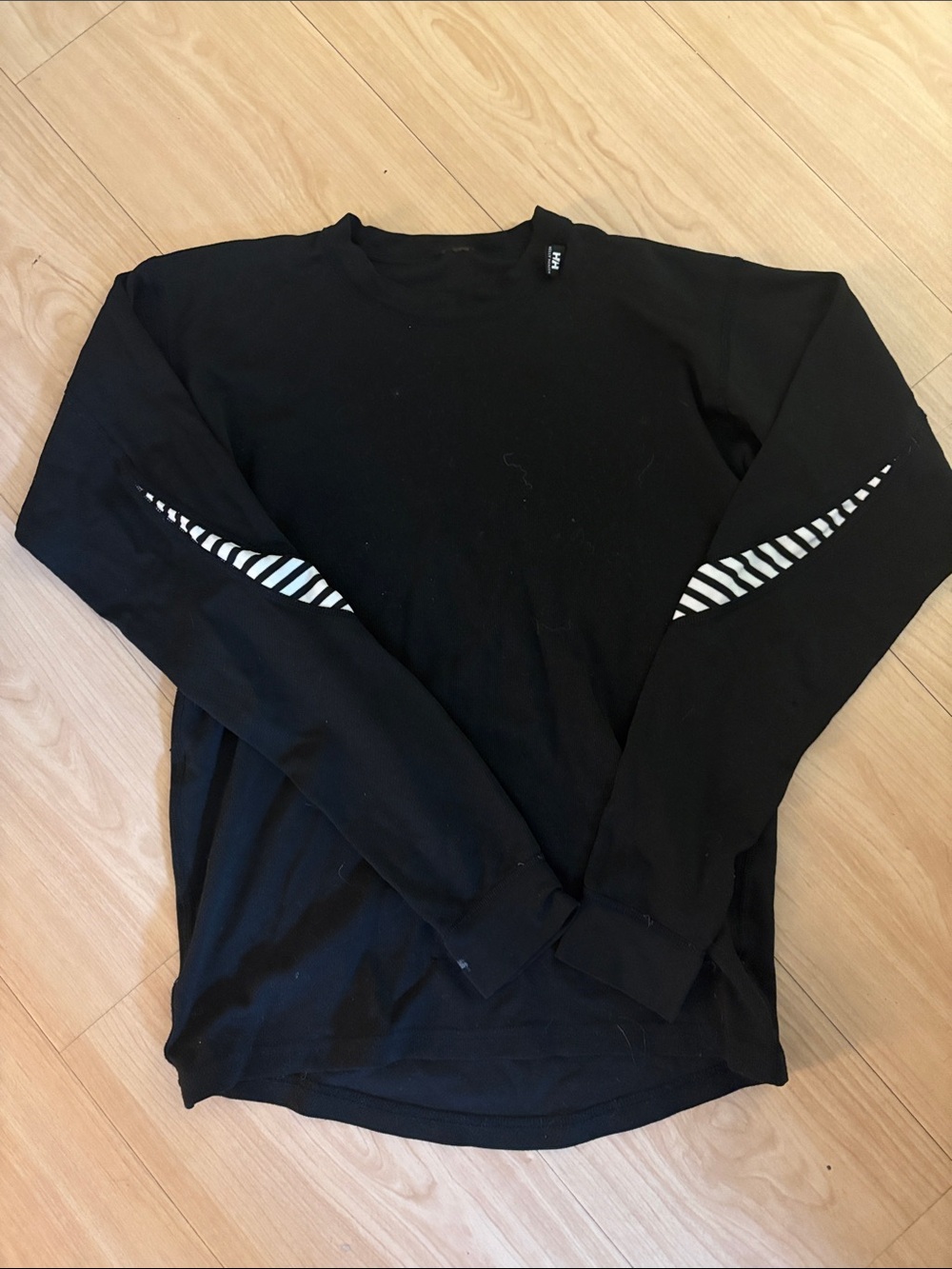 Woman’s helly Hanson Long-Sleeve Crew Neck Shirt with Striped Sleeve Detail